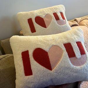 2 pink/ red heart accent pillows